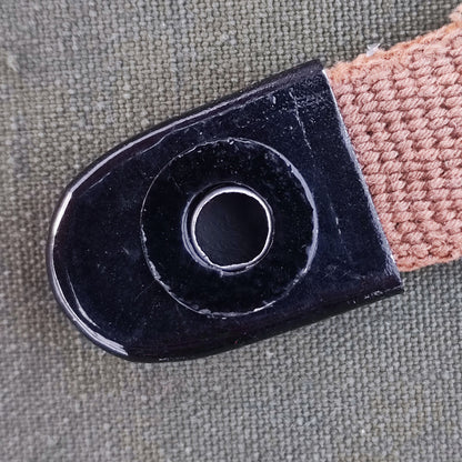 Aluminum grommet for field bottle cap