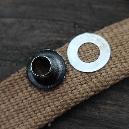 Aluminum grommet for field bottle cap