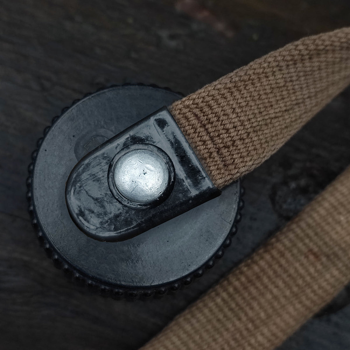 Aluminum grommet for field bottle cap